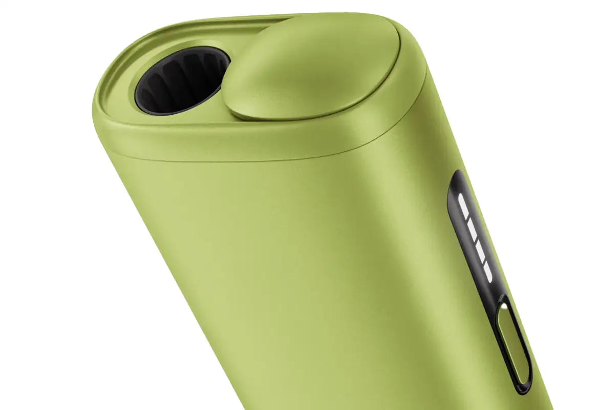 A sleek, matte olive-green puff bar device with a rounded top cap and black accent panel featuring indicator lights.